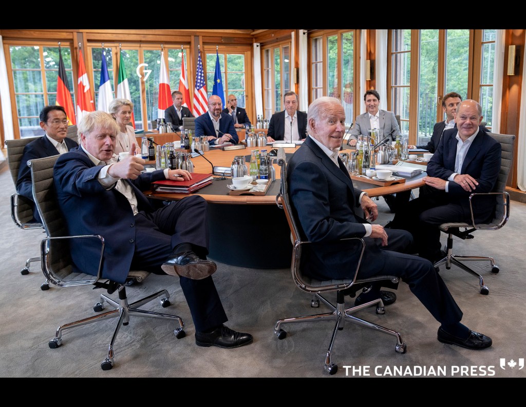 British Prime Minster Boris Johnson gives a thumbs up joining Japan Prime Minister Fumio Kishida, Ursula von der Leyen, President European Commission, Charles Michel President European Council, Italian Prime Minister Mario Draghi, Prime Minister Justin Trudeau, French President Emmanuel Macron, German Chancellor Olaf Scholz, and US President Joe Biden for a G7 working session in Schloss Elmau on Tuesday, June 28, 2022. THE CANADIAN PRESS/Paul Chiasson